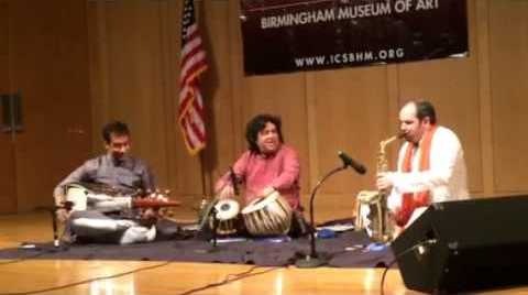 Jesse Bannister, Dr. Rajeeb Chakraborty and Pt. Subhen Chatterjee, sat playing at the Birmingham Museum of Art