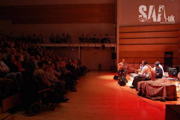 Widescreen photo of LCM showing the stage and the audience. 