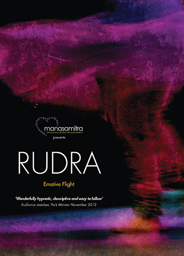 An overexposed image of a dancers dress which includes a gradation from pink to blue.